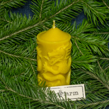 Beeswax candle - Dragon in front of fir tree branches